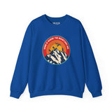 Blue sweatshirt featuring a colorful circle design with mountains, motocross, hiking, and Bigfoot, captioned 