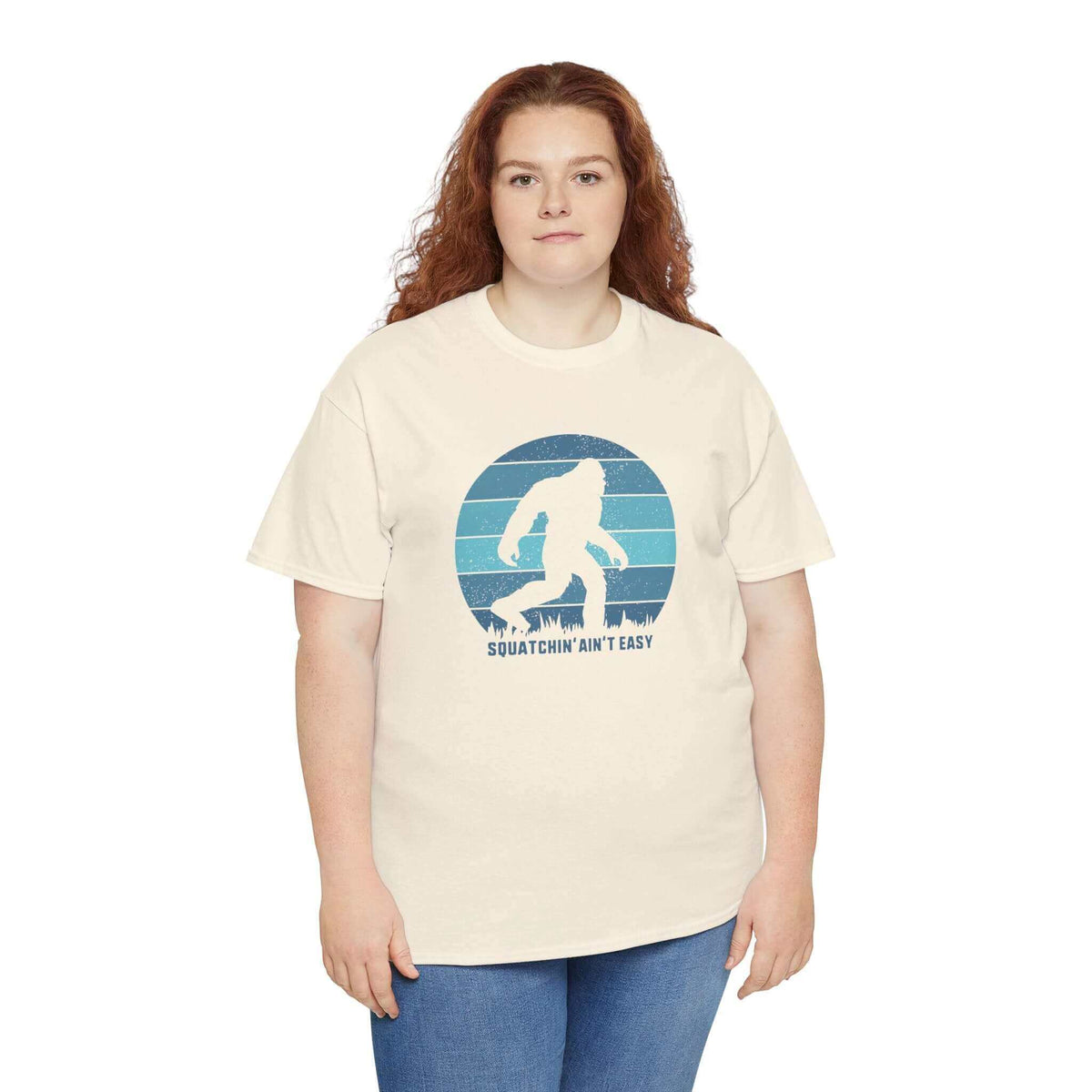 Woman wearing Squatchin' Ain't Easy athletic tee with Bigfoot graphic