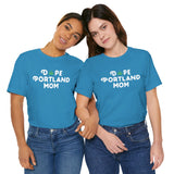 Two women wearing Dope Portland Mom tees with marijuana leaf design, showcasing vibrant PDX pride and laid-back style.