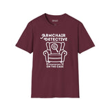 Armchair Detective T Shirt – Cozy True Crime Graphic Tee with armchair and magnifying glass design.