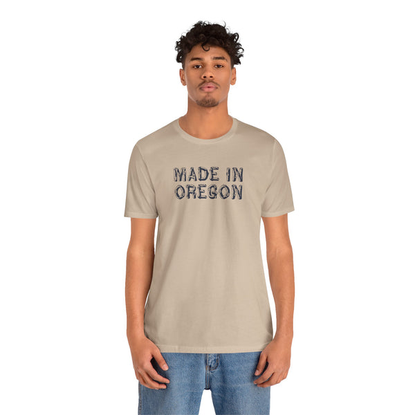 Premium soft tee with 'Made in Oregon' rustic log font, perfect for outdoor lovers and Oregon heritage enthusiasts.