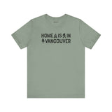 Home Is in Vancouver Tee featuring campfire and tree graphics, showcasing PNW pride.