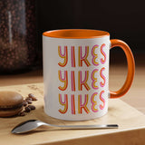 Retro Yikes Coffee Mug with a bold colorful design and an orange handle, perfect for a playful morning coffee.
