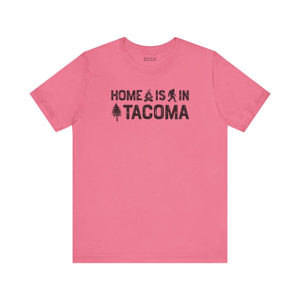 Home is in Tacoma tee in pink featuring campfire and tree graphics, celebrating Grit City pride.