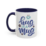 Hug in a Mug Coffee Mug featuring playful lettering and coffee bean motifs with a navy interior.
