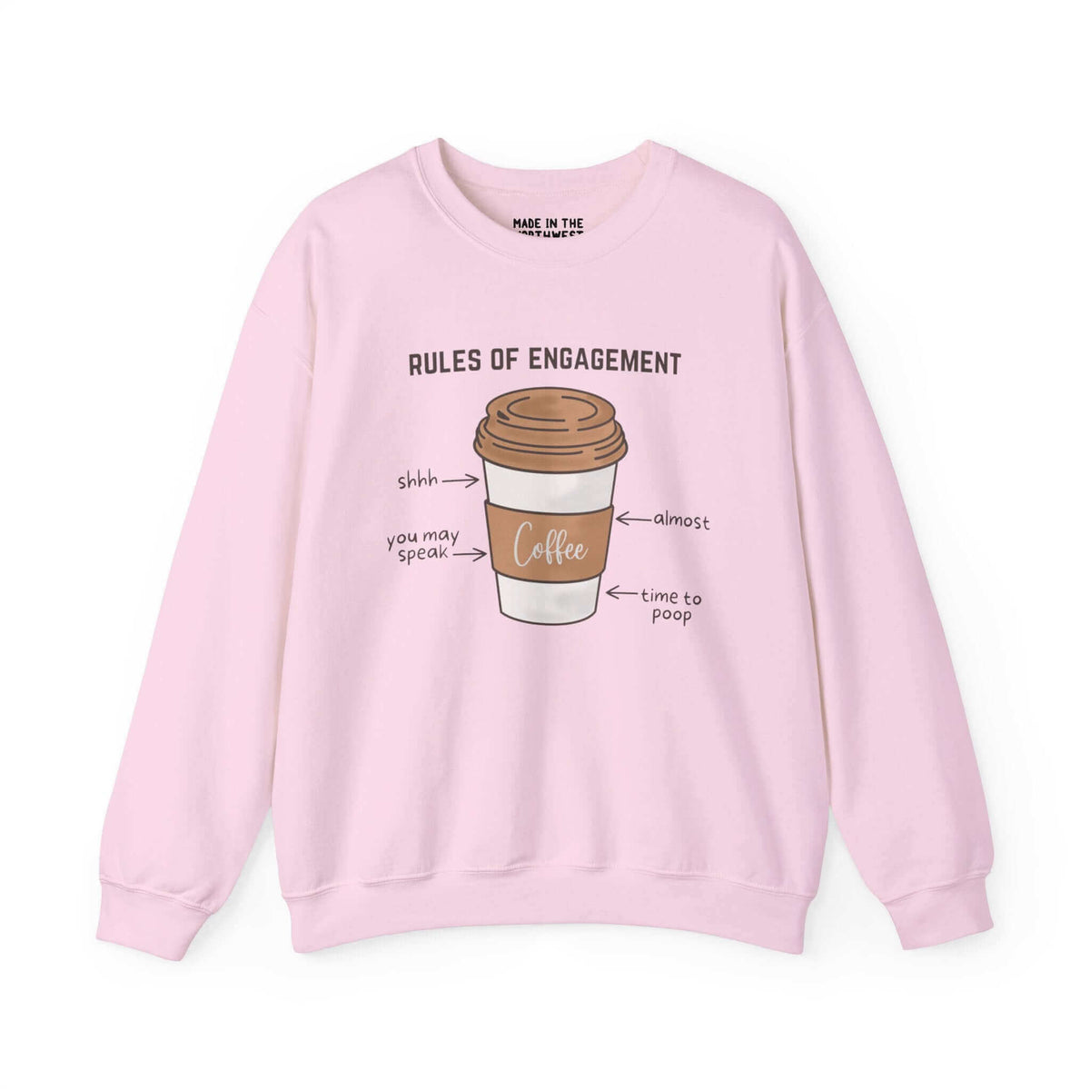 "Pink sweatshirt featuring coffee cup with 'Rules of Engagement' text, perfect for coffee lovers to showcase morning ritual humor."