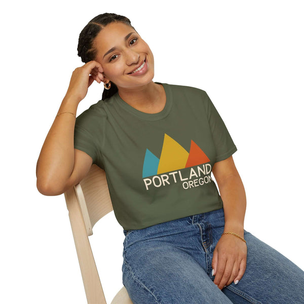 Young woman wearing a Modern Peaks Portland T Shirt, showcasing minimalist mountain design celebrating Portland.