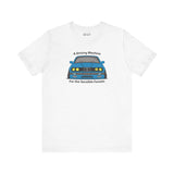 White soft tee featuring BMW E30 design with text 'A Driving Machine for the Sensible Fanatic'.