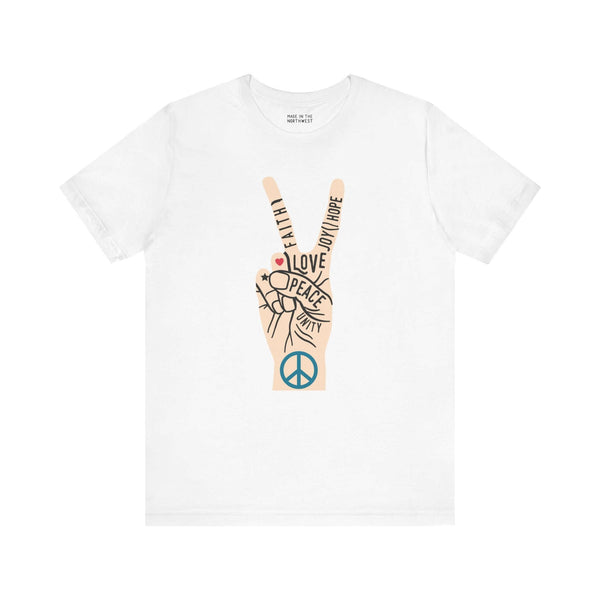 Power in Peace Premium Soft Tee featuring a hand peace sign with words of love, hope, faith, and unity.