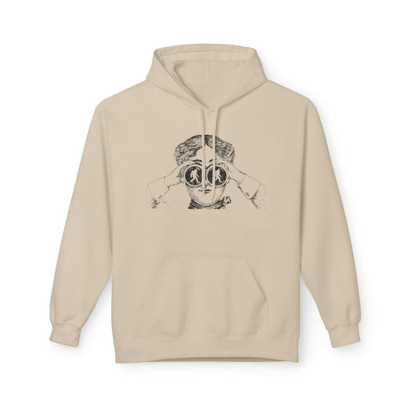 I spy Bigfoot hoodie featuring an explorer with binoculars on a beige background.
