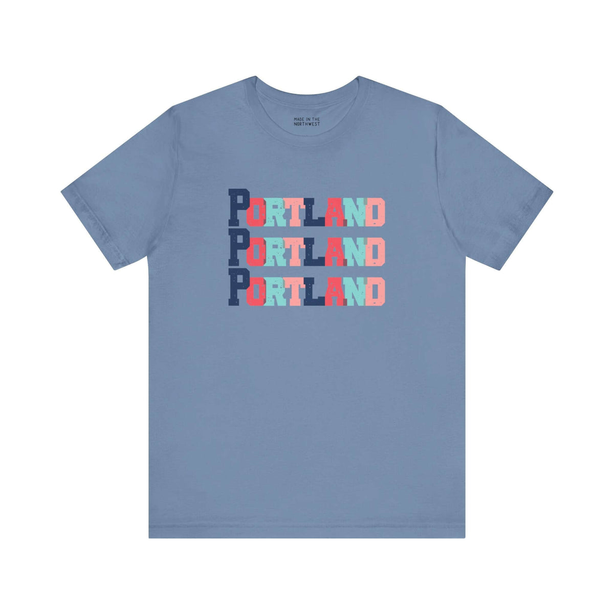 "Bold and Bright Portland Trio Soft Tee in blue with colorful block-letter design, perfect for Portland fans and locals."