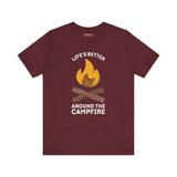 Life's Better Around the Campfire T Shirt featuring a fire graphic on a maroon background.