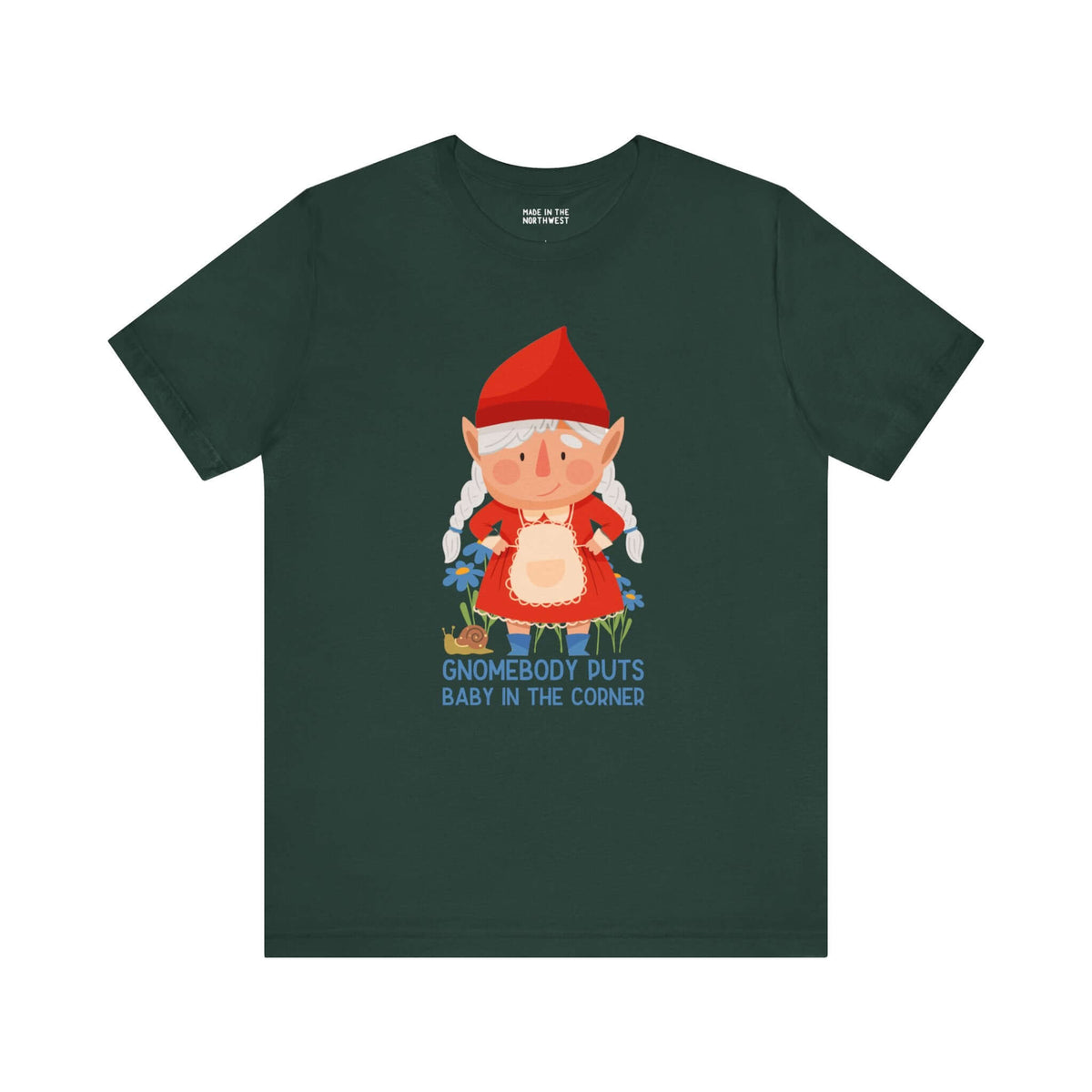 Green tee with a cute female gnome and the text "Gnomebody Puts Baby in the Corner" offering a playful twist on a classic movie line.