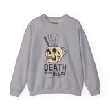 Gray sweatshirt featuring a skull-shaped coffee mug with 