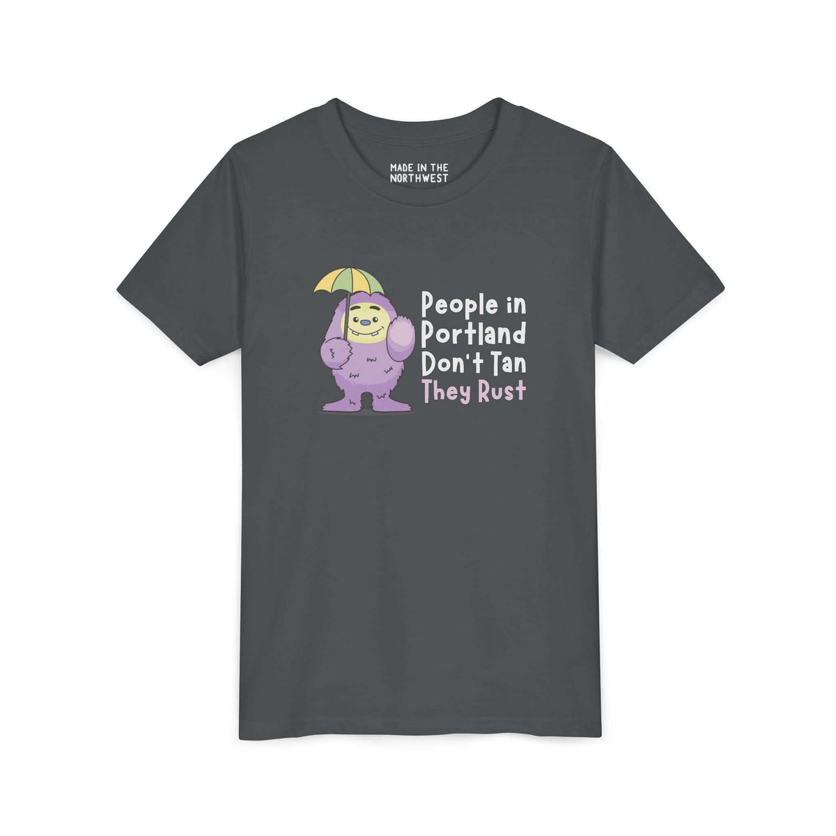 Kids heavy cotton tee featuring a playful Purple People Eater with an umbrella and text about Portland humor.