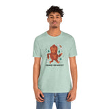 I Brake for Bigfoot premium soft tee featuring a whimsical Sasquatch graphic on a mint green shirt.