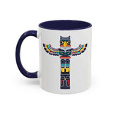 Ceramic Totem Pole Mug with colorful totem design and navy blue handle and interior.