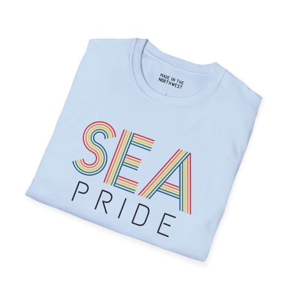 Pride in SEA Rainbow Softstyle T-Shirt featuring colorful lettering celebrating Seattle pride.