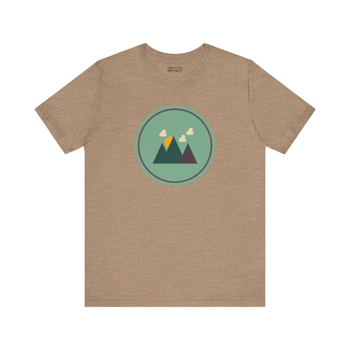 Minimalist forest design t-shirt in earthy tan color showcasing mountains and clouds, perfect for nature lovers.