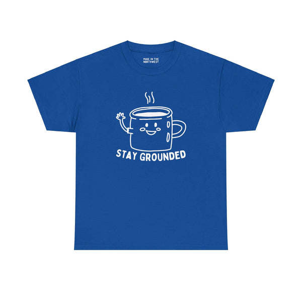 Blue athletic tee with an illustrated coffee mug and text "Stay Grounded" for coffee lovers, emphasizes comfort and caffeinated charm.