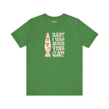 Green soft tee with 'Baby I Was Born This Gay' text design, celebrating pride and self-expression.