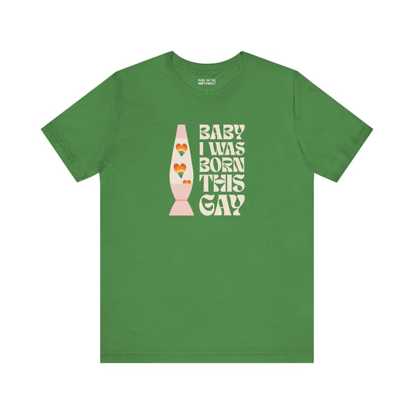 Green soft tee with 'Baby I Was Born This Gay' text design, celebrating pride and self-expression.