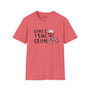 Coral Wine & True Crime softstyle t-shirt featuring a wine glass and handcuffs graphic.