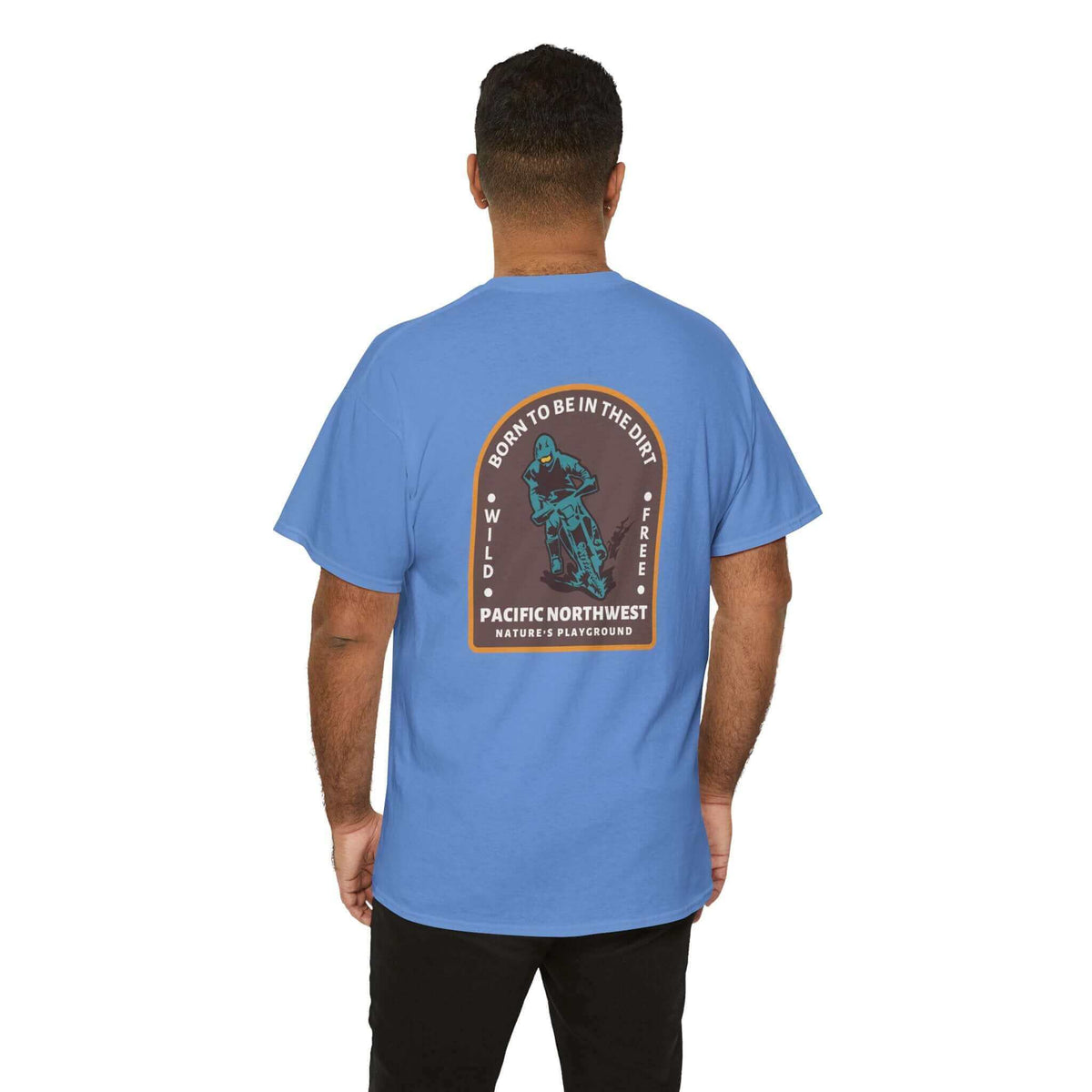 Man wearing a blue "Born to Be in the Dirt" athletic tee, featuring a rugged outdoor design on the back. Perfect for adventurers.