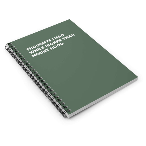 Green spiral notebook titled 'Thoughts I Had While Higher Than Mount Hood' for capturing ideas and reflections.