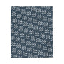 PNW blanket featuring a pattern of crossed arrows and PNW initials, perfect for cozy comfort and adventure.