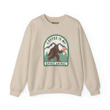 Beige sweatshirt featuring a Sasquatch with coffee and 