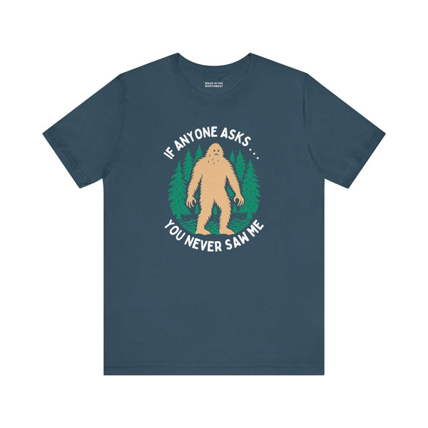 You Never Saw Me Tee featuring a Bigfoot silhouette and text on a dark blue shirt, perfect for humor lovers.