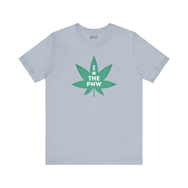 Light gray tee with green marijuana leaf and "I (Weed) the PNW" text, celebrating Pacific Northwest spirit.