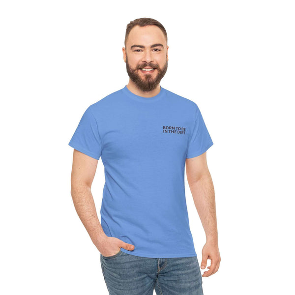 Man wearing blue "Born to Be in the Dirt" athletic tee, perfect for adventurers and outdoor enthusiasts.