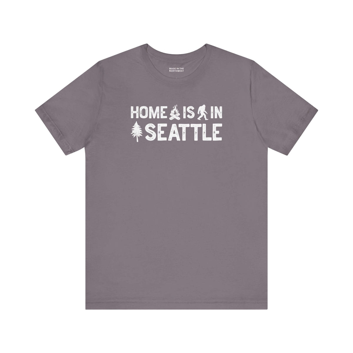 Home Is in Seattle Tee featuring campfire, Bigfoot, and tree designs celebrating Seattle pride.