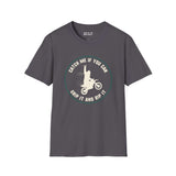 Gray softstyle t-shirt featuring a Bigfoot motocross design with the text 'Catch Me If You Can, Grip It and Rip It'.