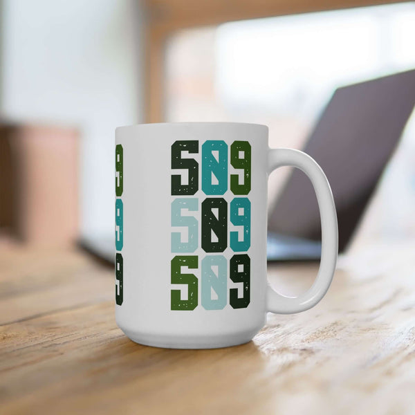 Five-Oh-Nine Pop Spokane ceramic mug with vibrant 509 design, perfect for showcasing Eastern Washington pride.