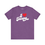 I love Tacoma t shirt in purple with white cursive text and a red heart design.