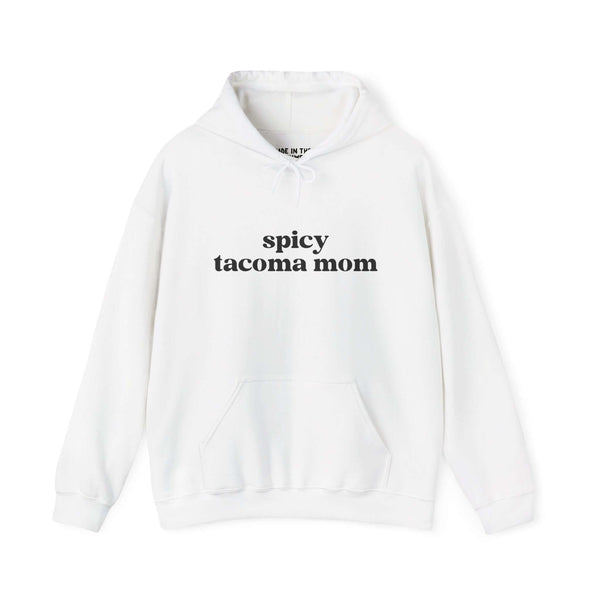 White hoodie featuring the text 'spicy tacoma mom' great for stylish Tacoma moms.
