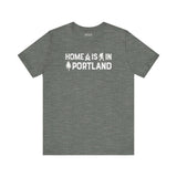 Home Is in Portland Tee – gray t-shirt featuring text and illustrations celebrating Portland pride.