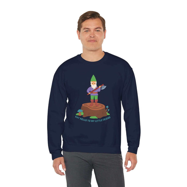 Man wearing "Say Hello to My Little Friend" gnome sweatshirt, featuring a cartoon gnome with an axe standing on a stump.