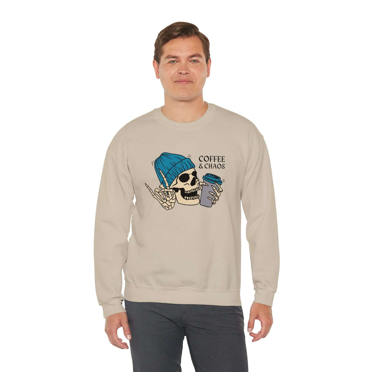 Man wearing Coffee & Chaos Skeleton Vibes Sweatshirt with skeleton graphic and coffee cup, embodying rebellious coffee spirit.