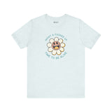 Light teal t-shirt featuring a smiling daisy and the text 'What a F*cked Up Time to Be Alive'.