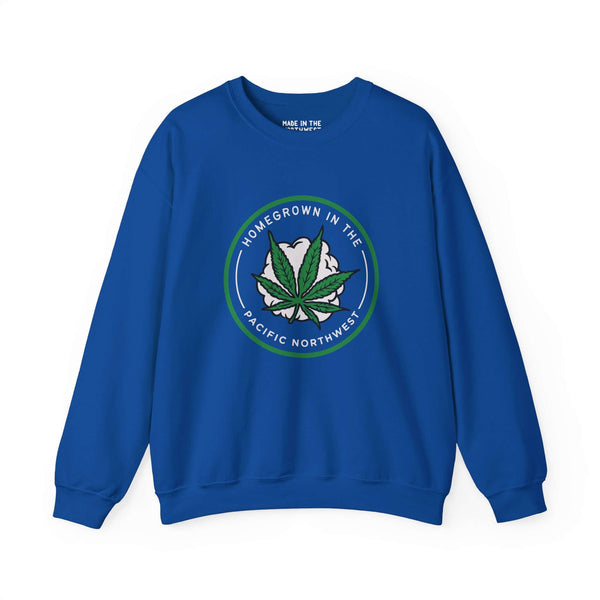 Blue sweatshirt with a marijuana leaf and "Homegrown in the Pacific Northwest" design, celebrating PNW lifestyle and culture.