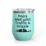Pairs Well with Traffic and Drizzle Portland PNW Wine Tumbler 12 oz on a turquoise background.