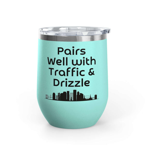 Pairs Well with Traffic and Drizzle Portland PNW Wine Tumbler 12 oz on a turquoise background.