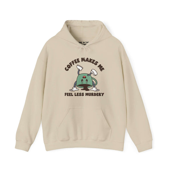 "Beige hoodie with 'Coffee Makes Me Feel Less Murdery' design, featuring a cartoon coffee pot, perfect for coffee lovers."