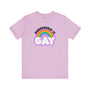 Homophobia Is Gay T shirt featuring colorful rainbow design on a light purple background.