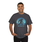 Man wearing Squatchin' Ain't Easy athletic tee with Bigfoot graphic, showcasing unisex fit and Northwest legends theme.