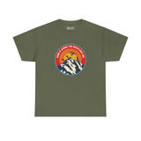 Olive green athletic tee with 'Home is Where the Mountains Are' design featuring mountains, hiking, motocross, and Bigfoot illustration.